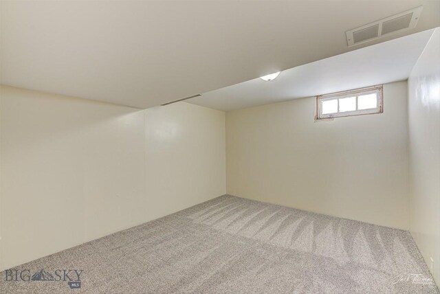 700 4th, Deer Lodge, MT 59722 - below grade area featuring carpet and visible vents