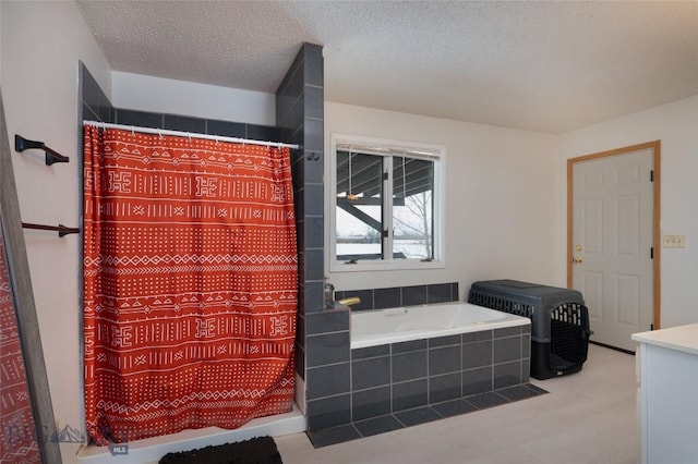 full bath with a textured ceiling, wood finished floors, a shower stall, and a garden tub