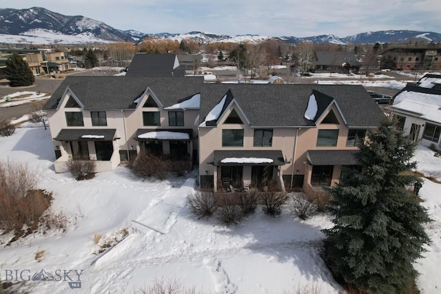 view of front of house featuring a residential view and stucco siding