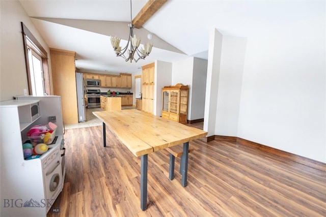 dining room featuring vaulted ceiling with beams, light wood finished floors, baseboards, and an inviting chandelier