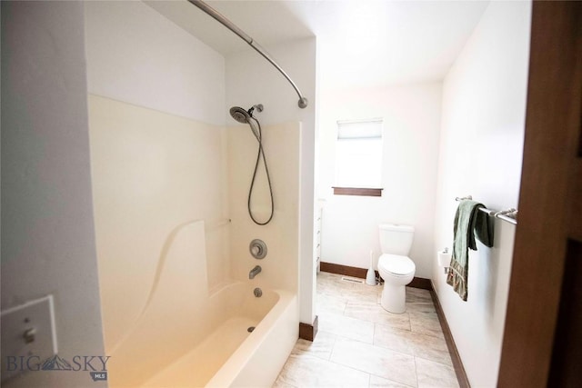 480 Prospector Trl, Bozeman, MT 59718 - bathroom with toilet, tub / shower combination, and baseboards
