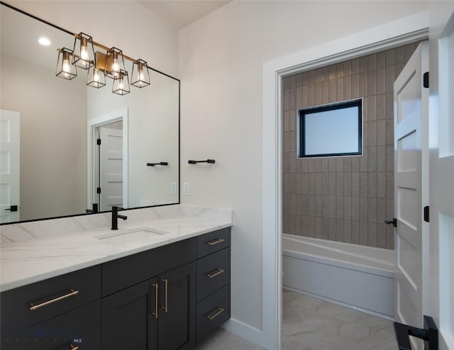 bathroom featuring marble finish floor, shower / bathtub combination, and vanity