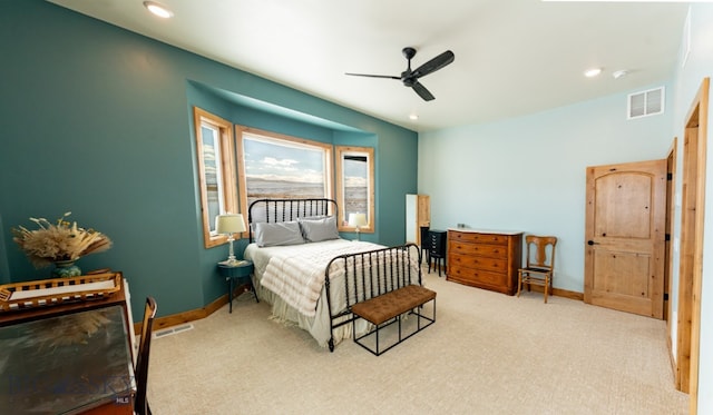 bedroom with carpet, visible vents, and baseboards