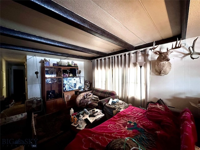 bedroom with beamed ceiling