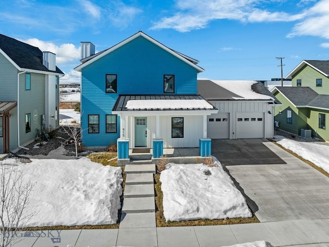 view of front facade featuring a porch, an attached garage, board and batten siding, cooling unit, and driveway