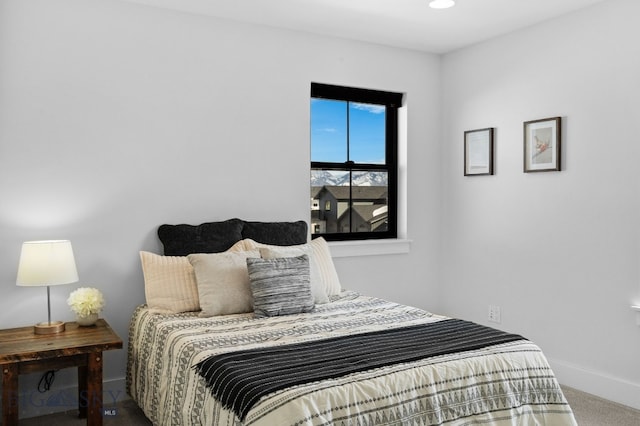 bedroom featuring recessed lighting, carpet flooring, and baseboards