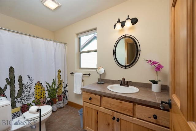 bathroom with tile patterned flooring, visible vents, vanity, and toilet