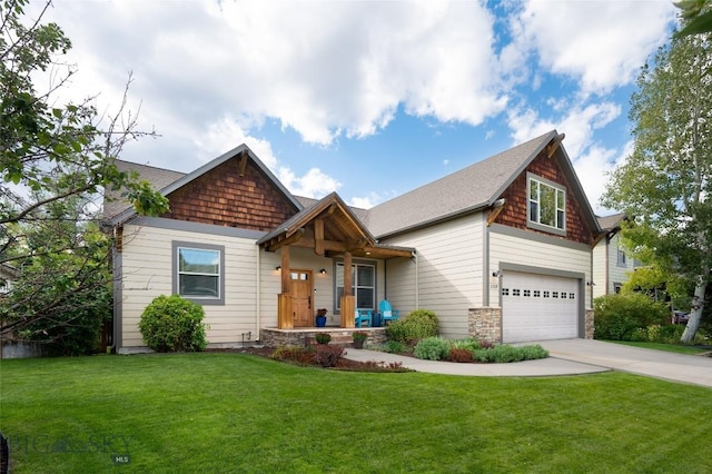 craftsman-style home featuring driveway, a garage, and a front yard