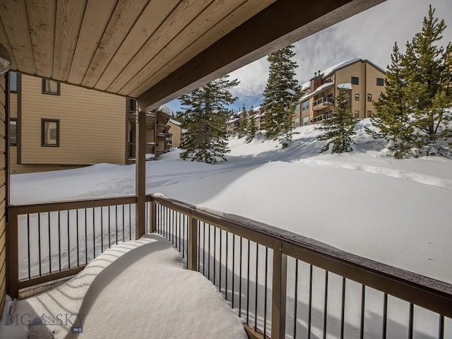 view of snow covered deck