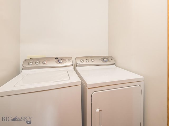 laundry room featuring laundry area and washer and clothes dryer