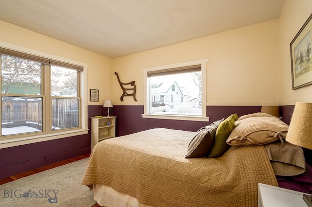 bedroom with wood finished floors