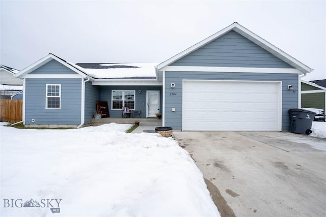 single story home with a garage, driveway, fence, and a porch