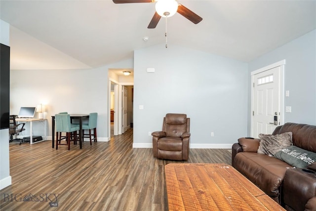 living area with vaulted ceiling, ceiling fan, wood finished floors, and baseboards