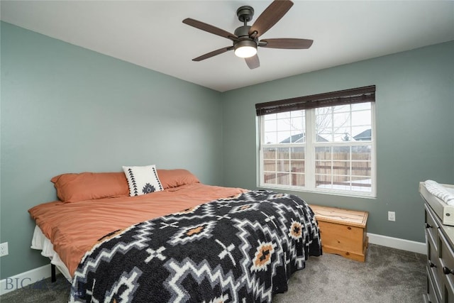 bedroom featuring carpet flooring, a ceiling fan, and baseboards