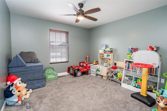 playroom featuring carpet and ceiling fan