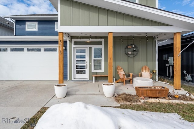 entrance to property featuring a porch and board and batten siding