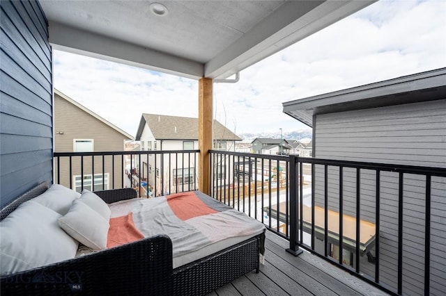 balcony featuring outdoor lounge area and a residential view