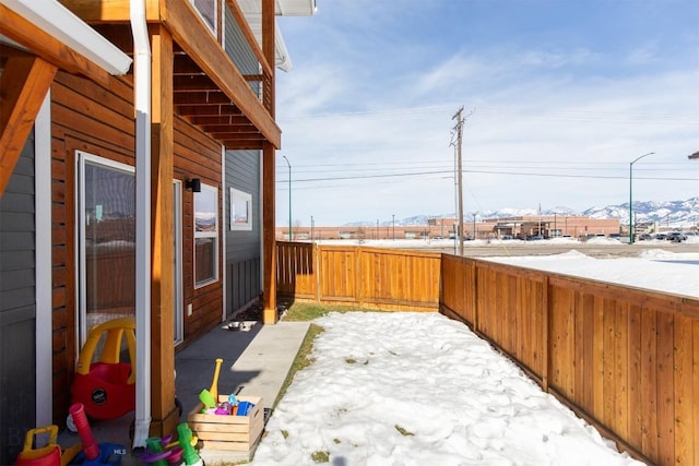 view of patio / terrace featuring fence