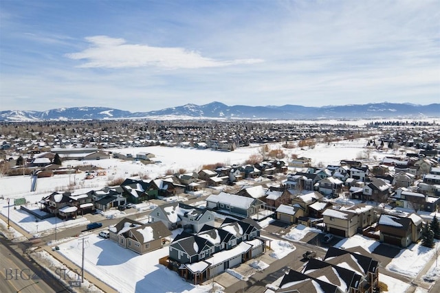 birds eye view of property featuring a mountain view and a residential view