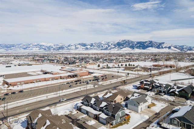 drone / aerial view with a residential view and a mountain view