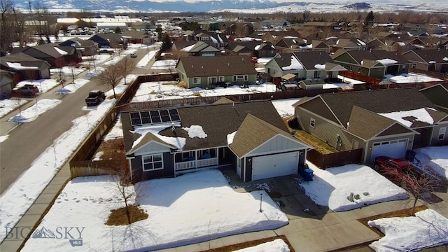 bird's eye view with a residential view and a mountain view