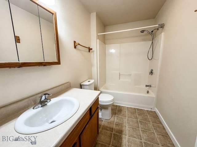 bathroom featuring shower / bath combination, toilet, and vanity