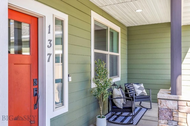 doorway to property featuring a porch