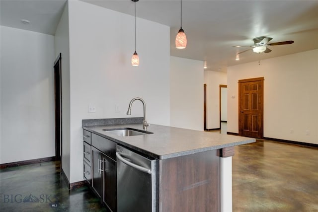 kitchen with concrete flooring, a sink, baseboards, stainless steel dishwasher, and pendant lighting