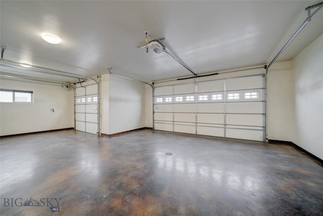 garage featuring baseboards