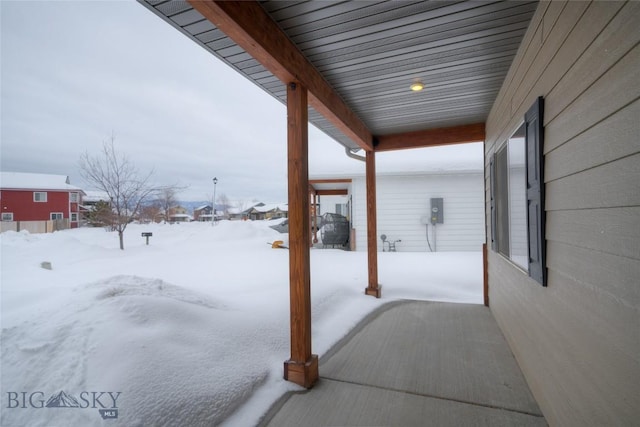 view of snow covered patio