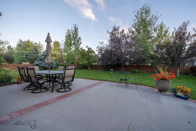 view of patio / terrace featuring outdoor dining area and a fenced backyard