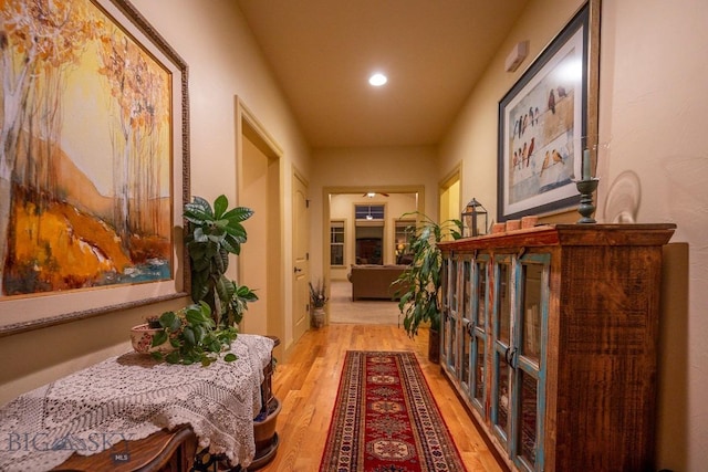 hallway with light wood-style flooring