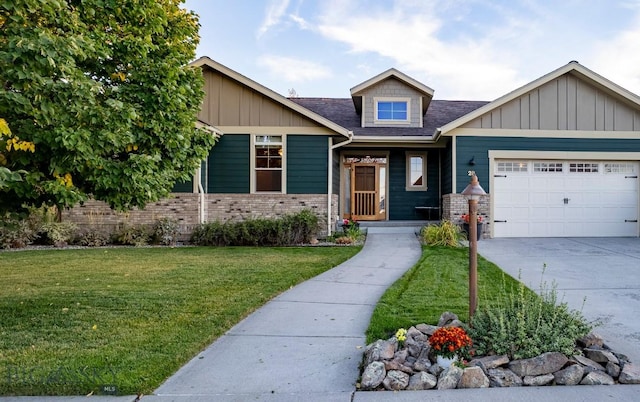 craftsman-style home featuring a garage, brick siding, driveway, board and batten siding, and a front yard