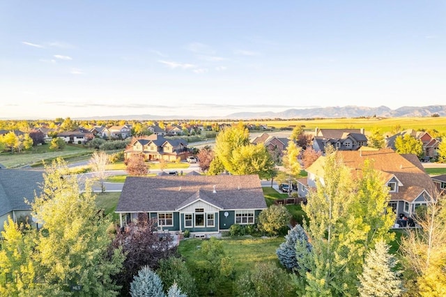 birds eye view of property with a residential view