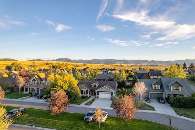 birds eye view of property featuring a mountain view and a residential view