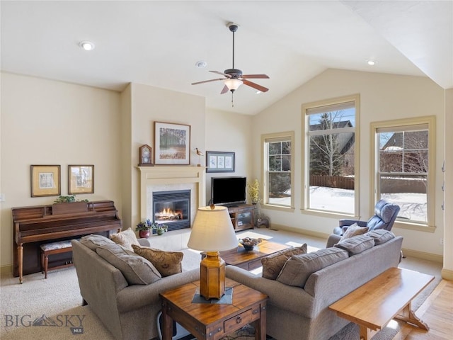 living room with lofted ceiling, recessed lighting, light carpet, a tile fireplace, and baseboards