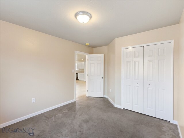 113 Washington St, Sheridan, MT 59749 - unfurnished bedroom featuring a closet and baseboards