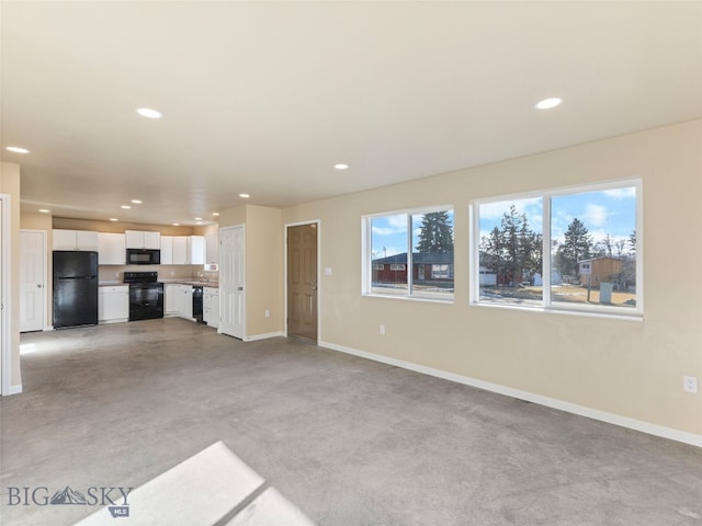 113 Washington St, Sheridan, MT 59749 - unfurnished living room with recessed lighting and baseboards
