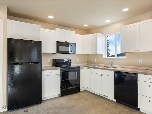 113 Washington St, Sheridan, MT 59749 - kitchen featuring black appliances, white cabinetry, a sink, and recessed lighting