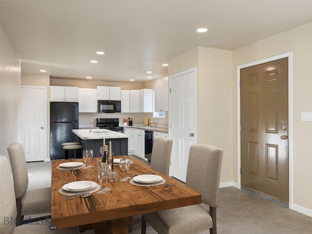 113 Washington St, Sheridan, MT 59749 - dining space with recessed lighting and baseboards