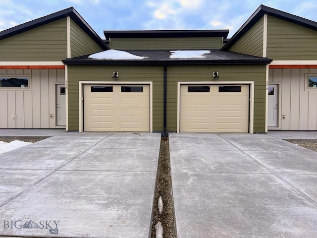 garage featuring driveway