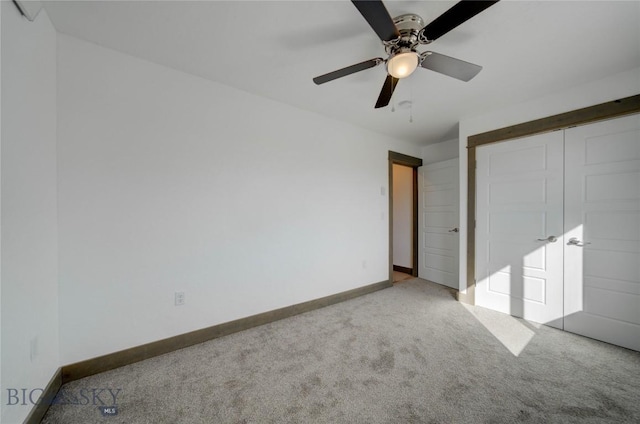 413 Garnier Ave Unit B, Livingston, MT 59047 - unfurnished bedroom featuring carpet, a closet, ceiling fan, and baseboards