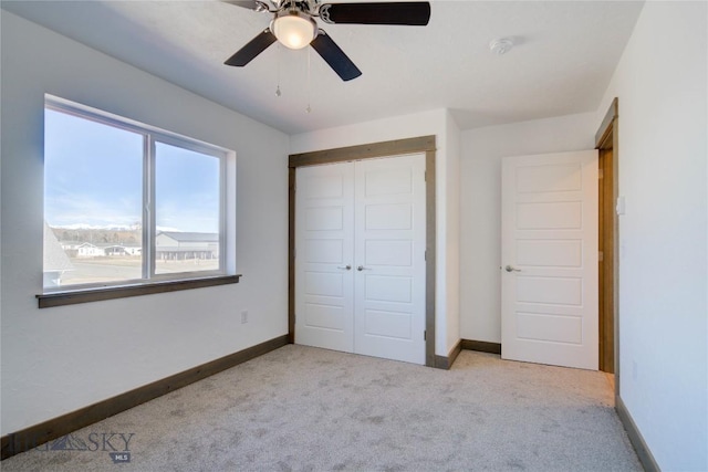 413 Garnier Ave Unit B, Livingston, MT 59047 - unfurnished bedroom with light carpet, a closet, and baseboards