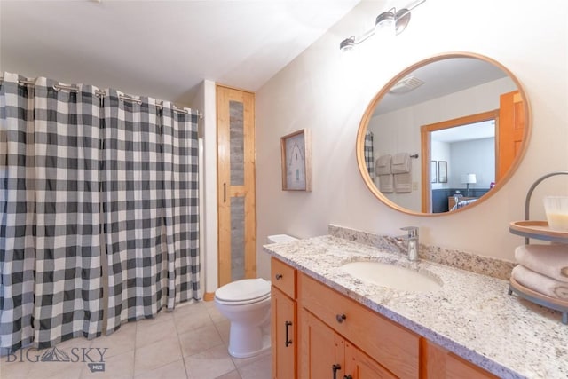 full bathroom featuring vanity, visible vents, tile patterned flooring, curtained shower, and toilet