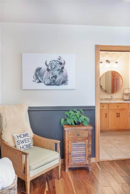 sitting room featuring light wood-style floors