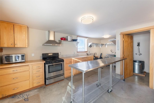 kitchen featuring light brown cabinets, open shelves, stainless steel appliances, concrete floors, and wall chimney exhaust hood