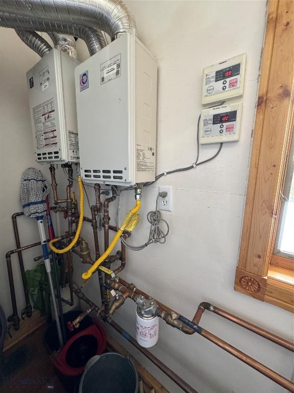 utility room with water heater