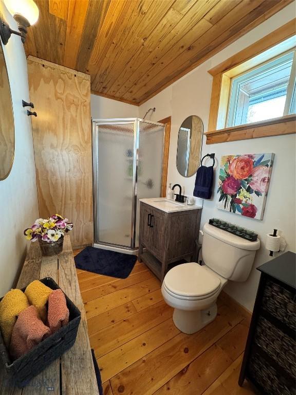 full bathroom featuring a stall shower, wooden ceiling, and hardwood / wood-style flooring