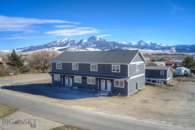 traditional-style house featuring a mountain view