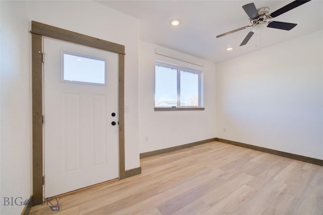 entryway featuring baseboards, recessed lighting, a ceiling fan, and light wood-style floors